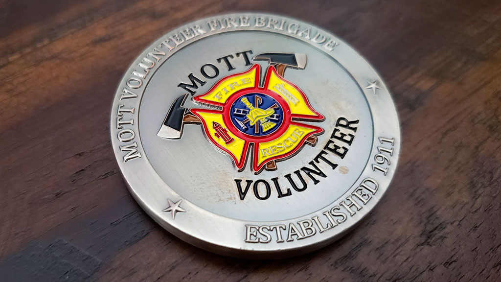 mott volunteer firefighter coin front
