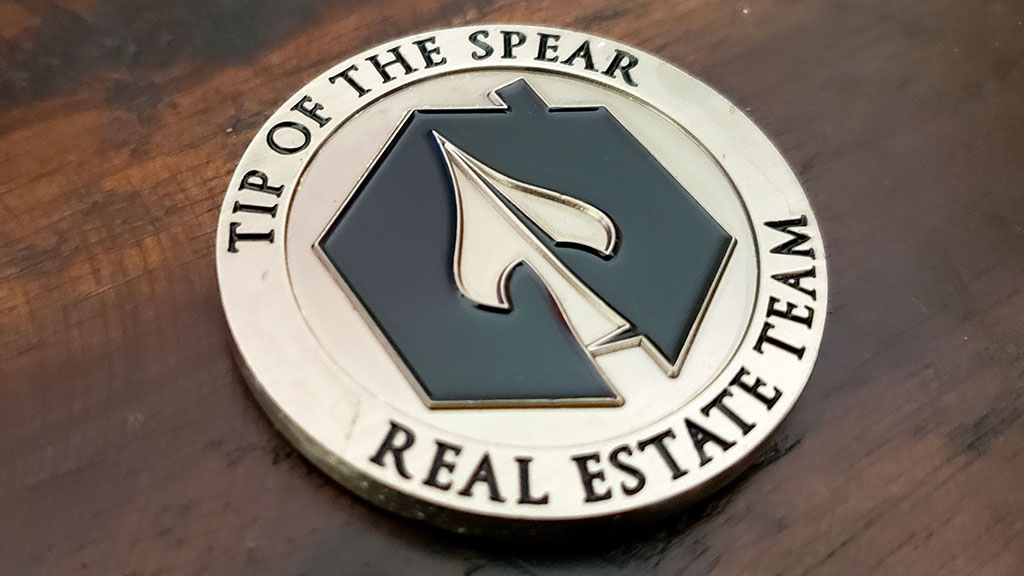 tip of the spear coin front