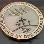 Veteran challenge coin symbolizing service and identity.
