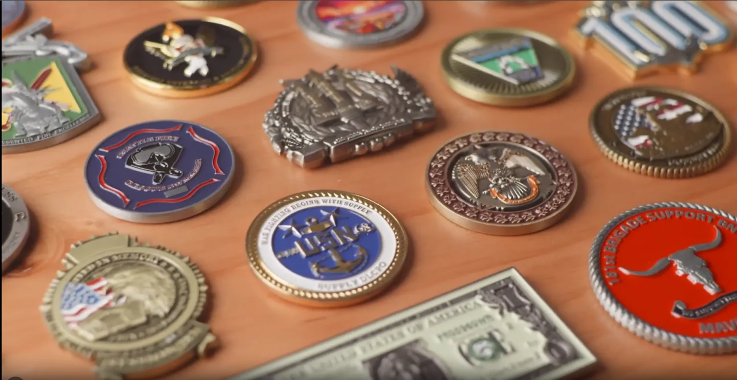 Custom challenge coins created by Embleholics