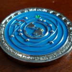 The SpaceX Starlink Challenge Coin centers on the Western Hemisphere—highlighting the Americas and the growing reality of a more connected continent.