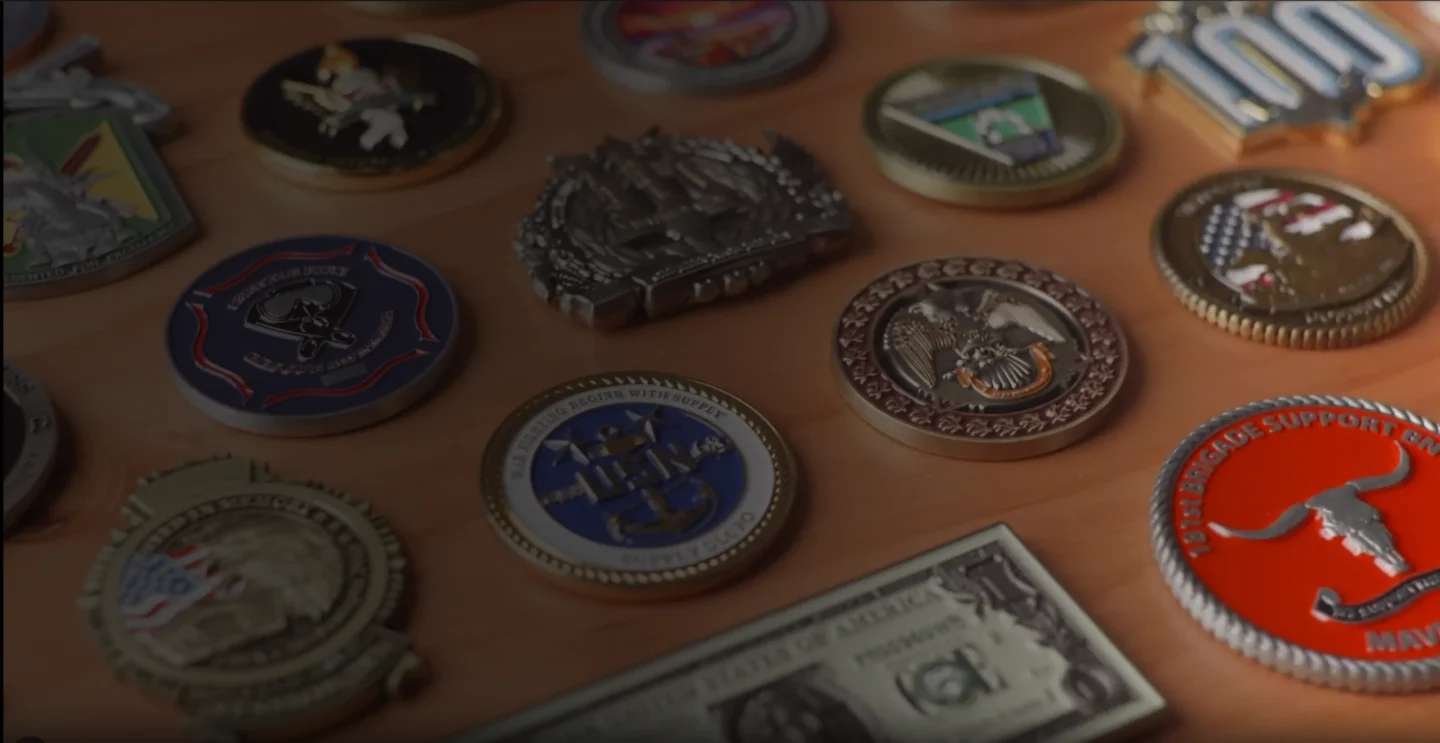 Custom challenge coins created by Embleholics